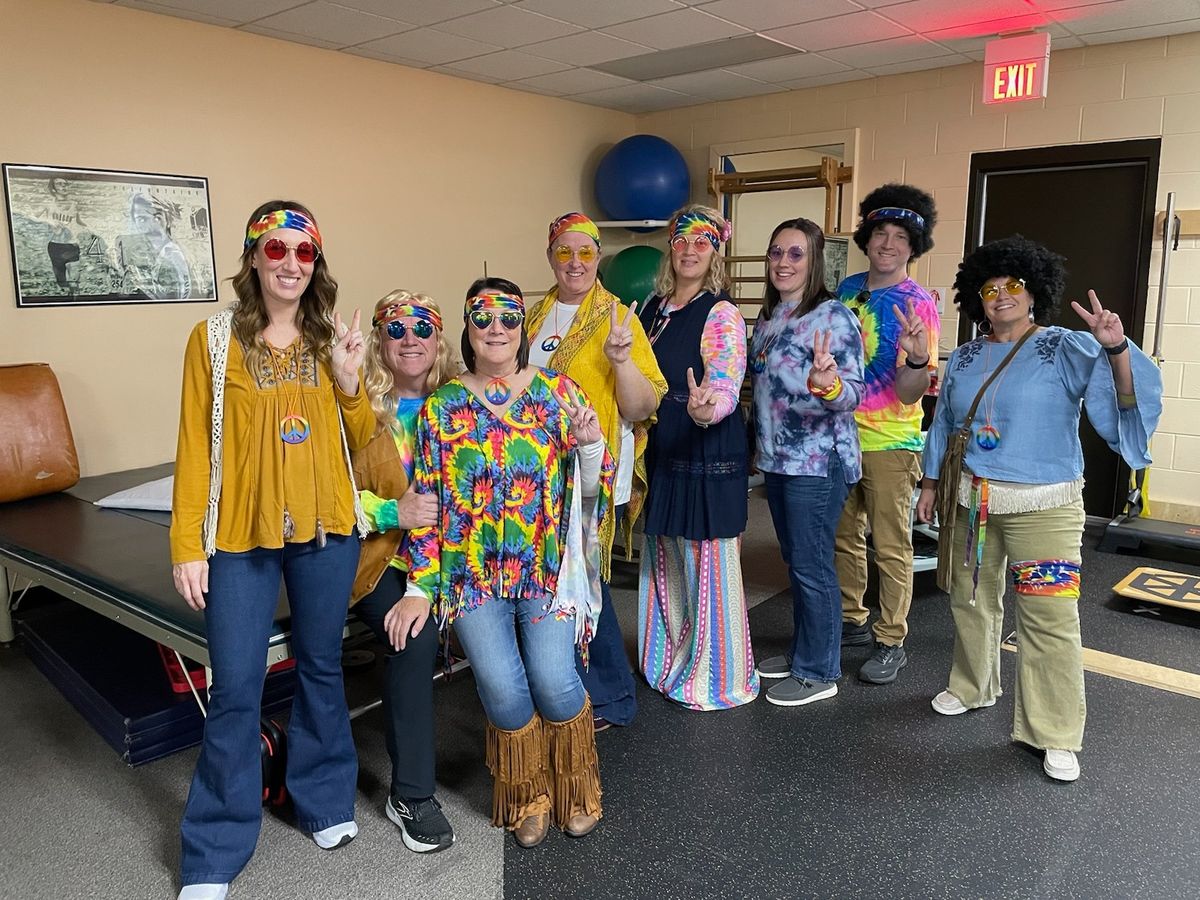 Mountain Town Rehab team in hippie Halloween costumes